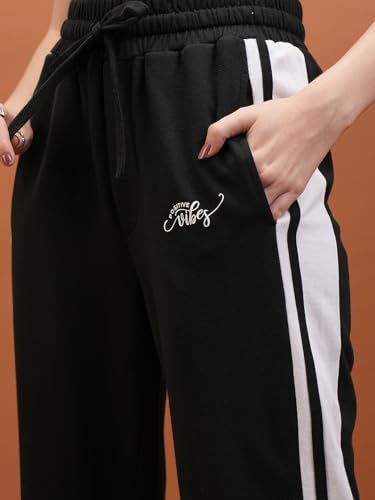 Image of Tokyo Talkies Women's Flared Regular Track Pants | Stretchable Trackpants | Casual Track Pants| Mid-Rise| Gymwear | Sports Wear
