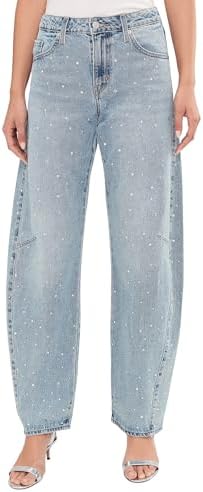 Woman walking confidently in Levi's Baggy Dad Barrel jeans.