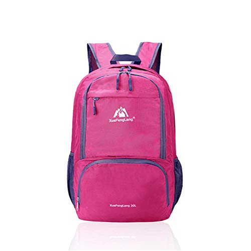 Sac étanche de voyage rose pour protéger vos affaires de la pluie