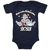 Blauer-Storch Baby Body in Dunkelblau Mein Erstes Weihnachten, Seehunde Seerobben mit Weihnachtsmützen Spruch Geschenk zu Weihnachten, Nikolaus für Kleinkind Kurzarm Bio Baumwolle