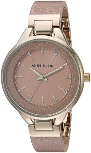 Anne Klein Women's AK/1408LPLP Premium Crystal Accented Gold-Tone and Light Pink Shimmer Resin Bangle Watch