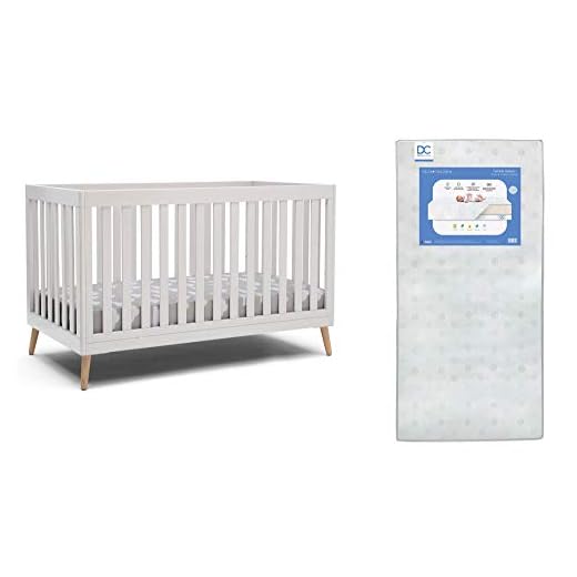 Delta Children Essex 4-in-1 Convertible Baby Crib, Bianca White with Natural Legs + Delta Children Twinkle Galaxy Dual Sided Recycled Fiber Core Crib and Toddler Mattress (Bundle)