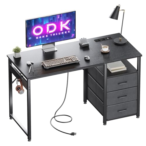 ODK Schreibtisch mit 3 Schubladen aus Stoff, 120x48x75.5cm Computertisch mit 2 Steckdosen und USB-Buchsen, Umkehrbarer PC Tisch Bürotisch für Home Office, Schwarz