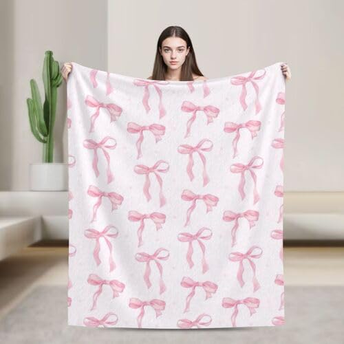 Couverture douillette en flanelle rose pour vos soirées canapé cosy