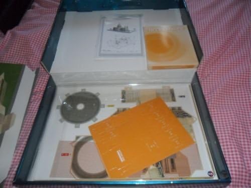 Interior view of the St. Paul's Cathedral 3D paper model kit box, showing various paper sheets and components.
