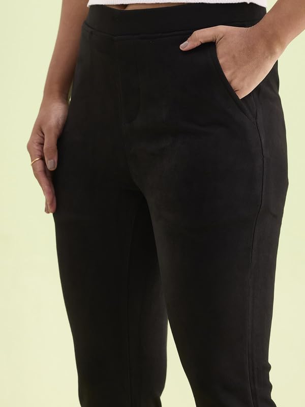 Image of GO COLORS Women Solid Mid Rise Suede Treggings