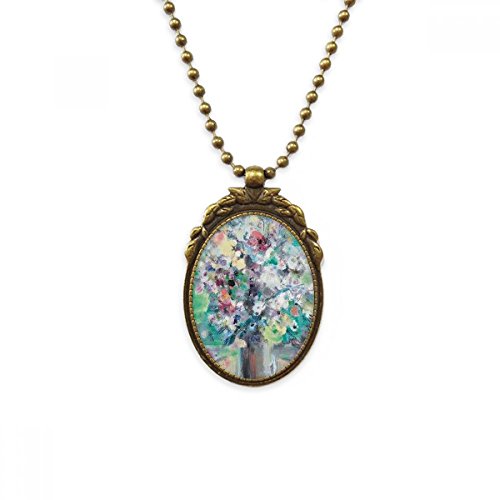 Collier fleur laiton antique pour sublimer un décolleté vintage