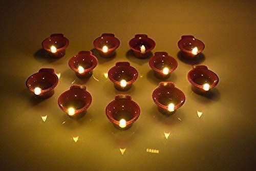K.B. SALES Water Smokeless Flameless Candles Water Sensor Diya for Home Decor Festivals Decoration Floating Led Light Diya Diwali Purpose Waterproof Candles Party (Pack of 12)