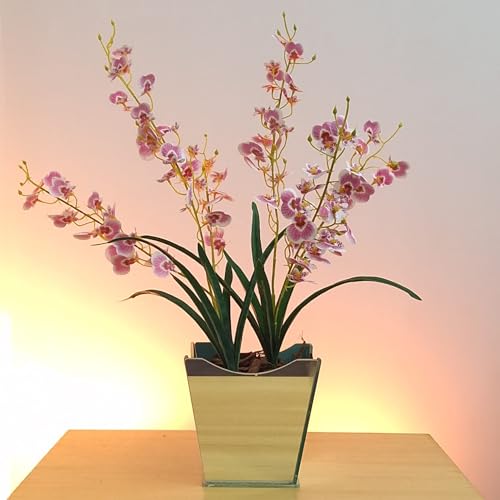 Arranjo de orquídeas artificiais em vaso espelhado