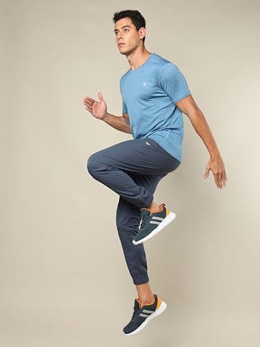 Image of TECHNOSPORT Men Mid Rise Regular Fit Solid Stretchable Joggers, Techno Dry for Regular Use and Sports
