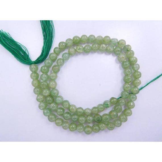 Gemas de prehnita natural pulidas de LKBEADS para alta bisutería en formato redondo
