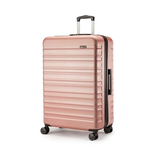 Amazon Basics Valise Rigide, Extensible et Grande Taille (78 cm), Coque en ABS Anti-rayures, 4 Roulettes Pivotantes, Or Rosé