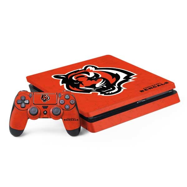 Skinit Decal Gaming Skin Compatible with PS4 Slim Bundle - Officially Licensed NFL Cincinnati Bengals - Alternate Distressed Design
