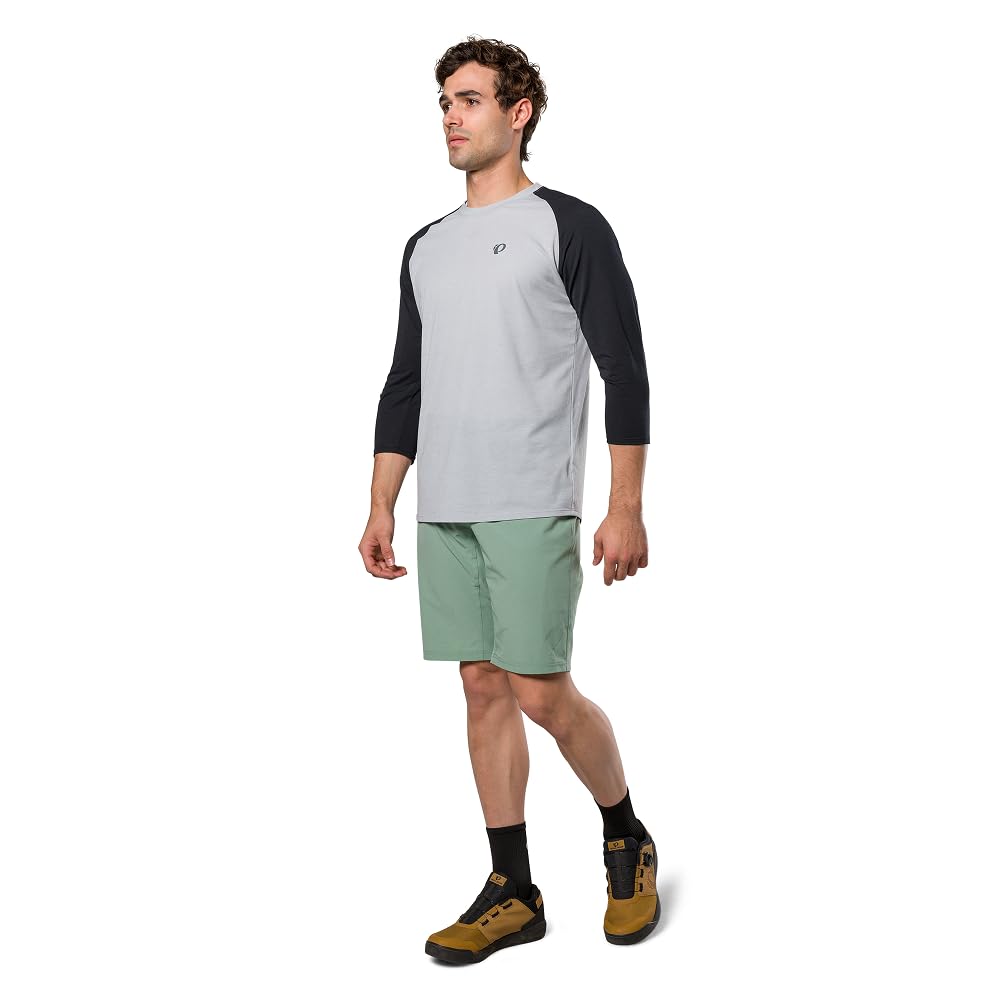 PEARL IZUMI Pantalón corto de ciclismo de montaña para hombre. Forro de gamuza desmontable y dos bolsillos con cremallera. Entrepierna cómoda y duradera de 11.5 pulgadas.