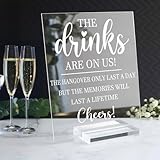 Stunning Elegance: Crafted from premium clear acrylic, this 8x10'' Drinks Are On Us sign for wedding radiates sophistication and charm. Its crystal-clear finish catches the light of your party, elevating your bar decor area into a stunning focal poin...