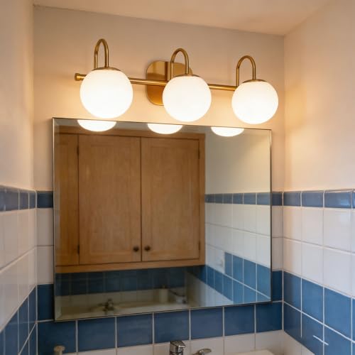 Luz de baño vintage sobre espejo ideal para maquillaje impecable 2