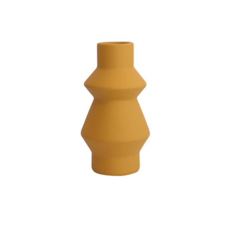 Vase en céramique jaune pour arrangement de fleurs séchées sur bureau