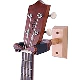 Bloqueo automático: bloquee su instrumento musical automáticamente al colocar el cuello del instrumento en el brazo, y suéltelo automáticamente mientras levanta su ukelele. Con un bloqueo del sensor de gravedad, para evitar que los instrumentos se cuelguen después de la caída, más seguros y efectivos.