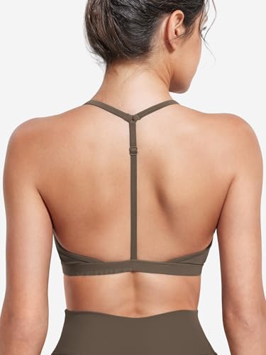 Image of YEOREO CoreFlex Sports Bras for Women Strappy Padded Halter Open Back Light Impact Deep V Neck Yoga Workout Gym Tops