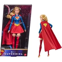 Barbie Signature DC Supergirl Fashion Doll, Blonde with Super Hero Costume & Cape, Collector Doll in Displayable Packaging & Doll Stand