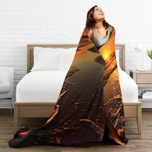 Couverture flanelle orange lever de soleil, un cocon de douceur chaude