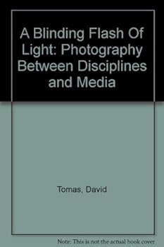 Paperback A Blinding Flash Of Light: Photography Between Disciplines and Media Book