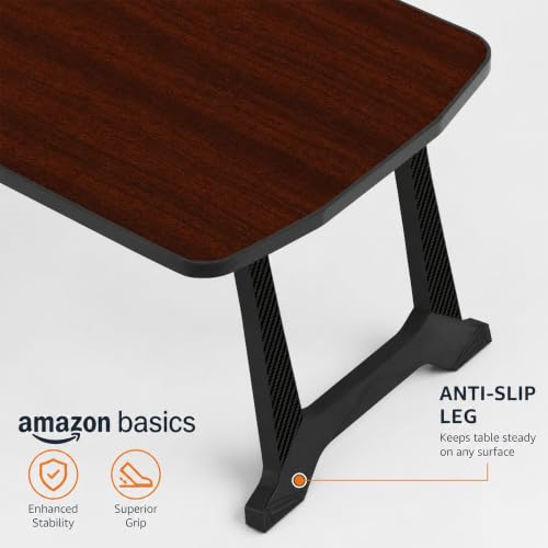 Image of Amazon Basics - CozyDesk Pro | Compact Foldable Lap Desk | Portable Bed Table for Laptop, Study, Meals | Engineered Wood Top with ABS Legs Table top 57 x 36, Height 28 cm (Royal Mahogany)