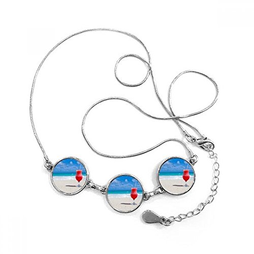 Plage de sable collier pendentif rond océan et jus de pastèque comme cadeau de bijoux unique