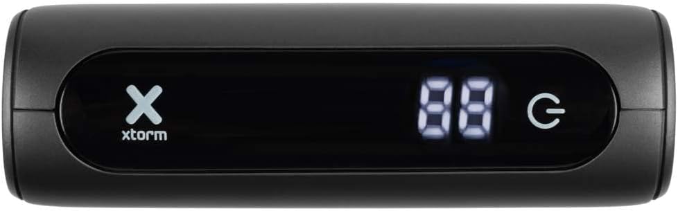 Close-up image of the Xtorm Power Bank's front display, showing a digital battery percentage indicator and a power button icon.