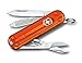 Price comparison product image Victorinox Classic SD Mini Swiss Army Knife, Camping Pocket Knives, 7 Functions, Blade, Keyring, Orange Transparent