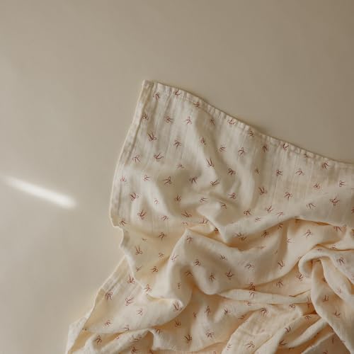 Image of mushie Muslin Baby Swaddle Blanket | 100% Organic Cotton (Bows)