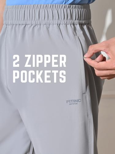 Image of FITINC Men's All-Season Relaxed Fit Track Pants | Stretchable Gym Lower with 2 Deep Zipper Pockets | Quick-Dry Athletic Joggers for Running, Workout & Yoga