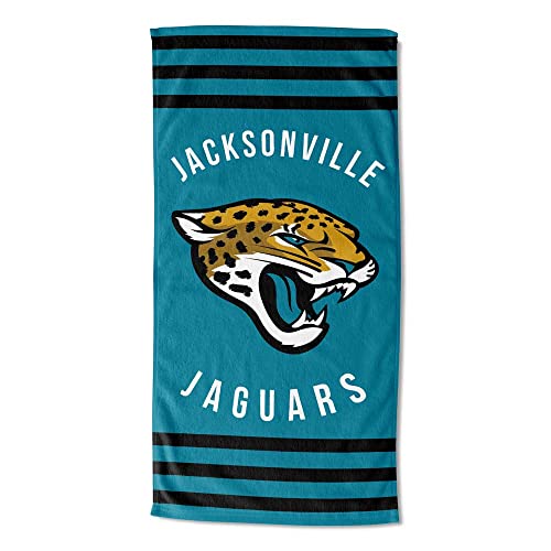 Image of Northwest NFL Jacksonville Jaguars Unisex-Adult Beach Towel, 30 inch x 60 inch, Stripes