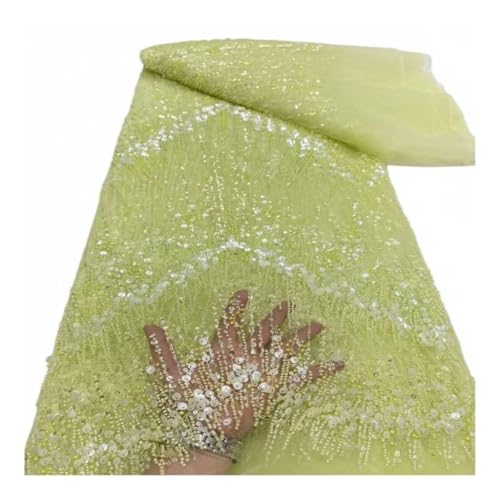 Tissu dentelle perles coquillage pour réussir une robe de mariée lumineuse et unique brodée W