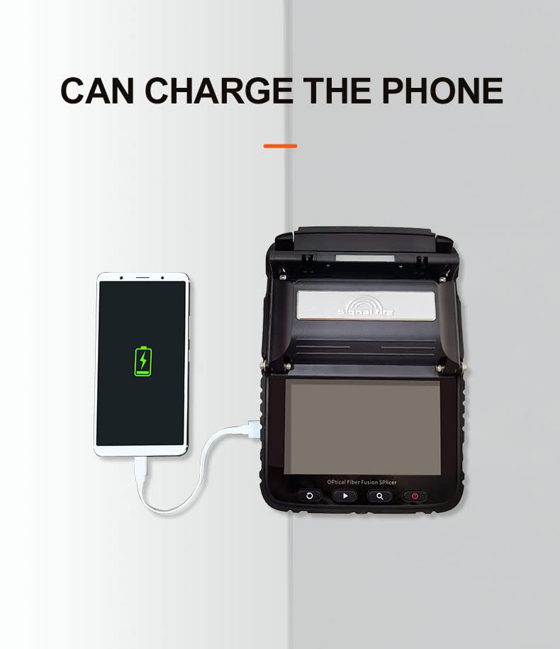 A mobile phone connected to the splicer's USB port for charging