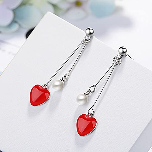 Bijoux en perles et longues gouttes d'oreilles d'exception