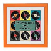 Created to frame your favourite 12" Vinyl sleeve within a precision cut white mount. The vinyl record frame is made of SOLID WOOD and comes in 9 stylish colours with high quality perspex front. Each 12" vinyl record frame will come complete with moun...
