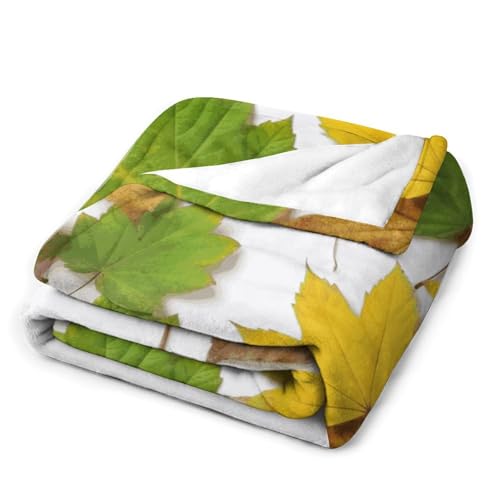 Couverture flanelle premium feuilles, une douceur d'exception pour lit et canapé
