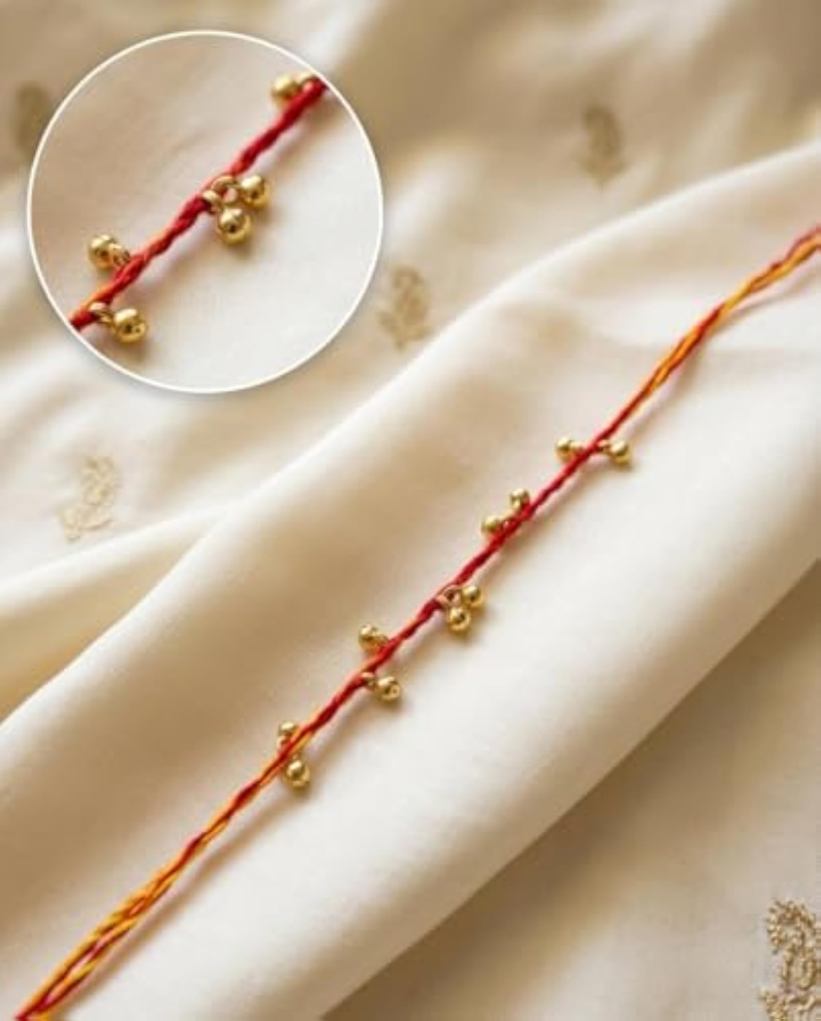 Set of 12 Moli Thread Rakhis with Golden Ghungroo
