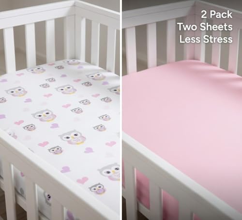 Image of EVERYDAY KIDS 2 Pack Fitted Girls Crib Sheet, 100% Soft Breathable Cotton Baby Sheet, Fits Standard Size Crib Mattress 28in x 52in, White Nursery Sheet with Pink Owls and Hearts and a Solid Pink