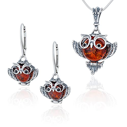 Joyas de plata de ley y ámbar báltico coñac con diseño de búho tallado