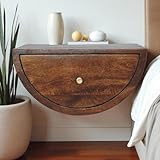 【Rangement Optimal】 Ce meuble combine un tiroir spacieux pour ranger vos télécommandes, chargeurs et autres petits objets avec une étagère ouverte qui offre un espace supplémentaire pour des livres, des plantes ou des décorations. Son design fonctionnel optimise l'espace tout en apportant une touche esthétique.