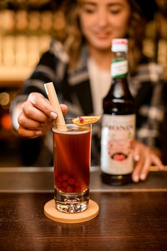 Monin Sirup Konzentrat Himbeer Tee (1 x 0,7l) - für erfrischende Getränke und kreative Cocktails - für Eistee - Teegetränke und Limonaden