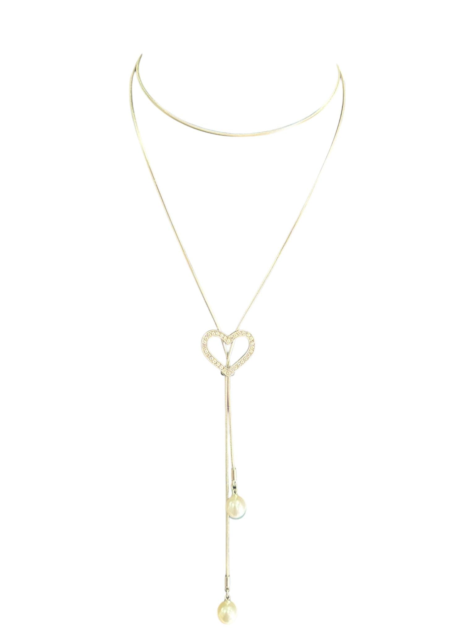 Generico Collana sale e scende in acciaio con cuore zirconato regalo donna per ogni evento e perle finali