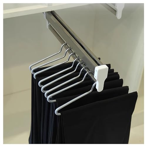 Rail à vêtements réglable pour optimiser un petit dressing