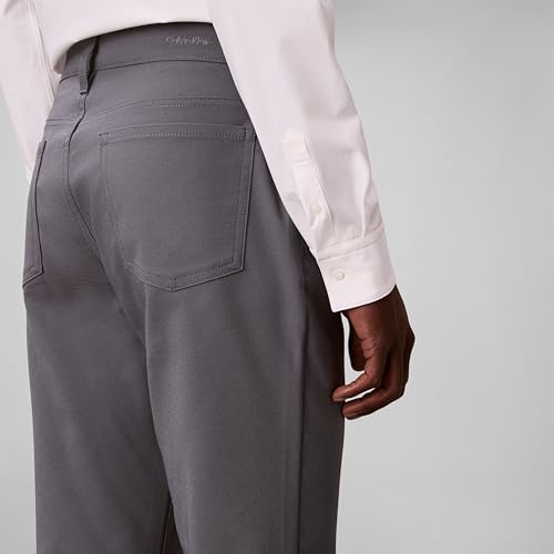 Image of Calvin Klein Men's Move 365 Stretch Slim Fit Wrinkle Resistant Tech Woven Pant