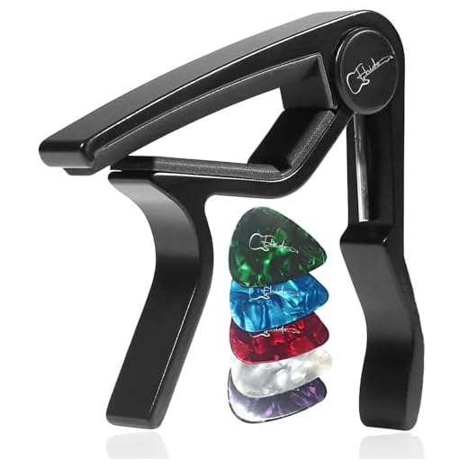 Cejilla de Guitarra para Electrica Acústica Folk Ukelele Bajo Guitar Aleación de Aluminio Guitar Capo con 5 Púas de Guitarra (Cejilla Negra + Púas, Musical, 1, FH-103)