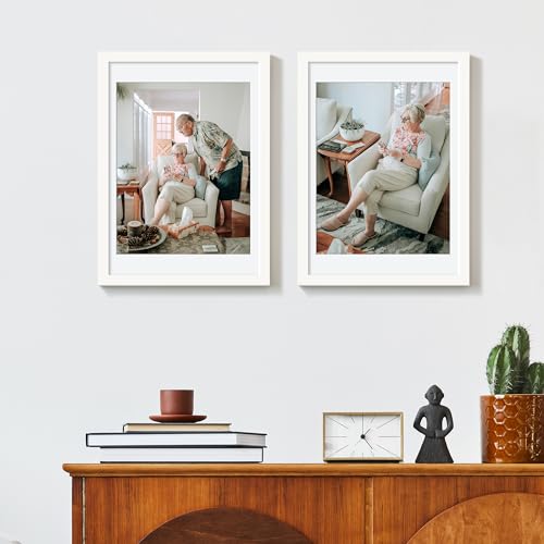 Image of upsimples 10x14 Picture Frame, Display Pictures 8.5x11 with Mat or 10 x 14 Without, Wall Hanging Diamond Frames, White, 1 Pack