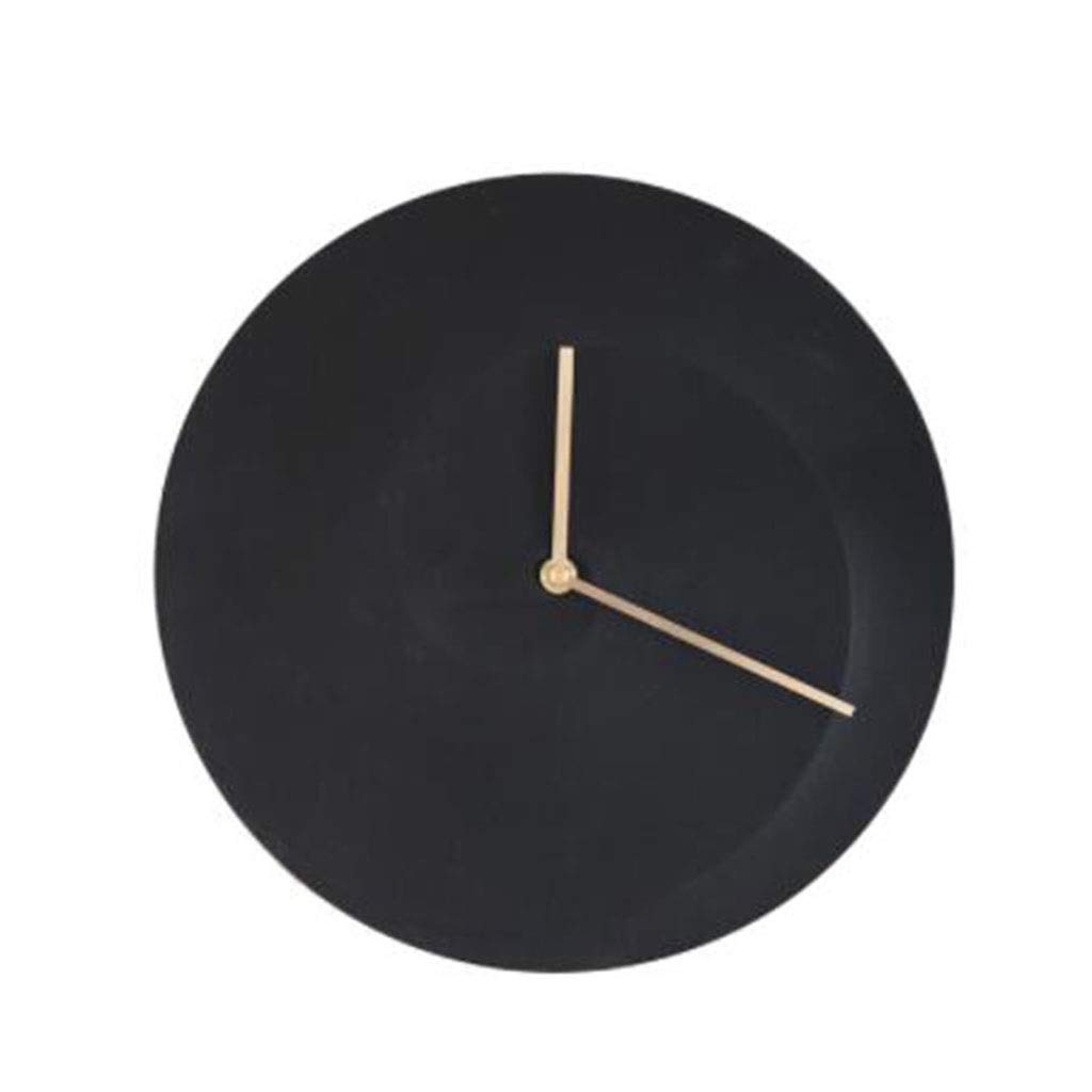 Horloge en marbre noir pour sublimer le mur du salon et votre espace de vie