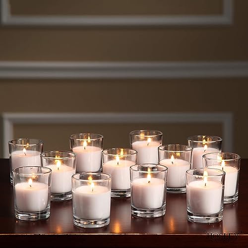 Image of Hosley 20-Pack Ivory Unscented Votive Candles in Clear Glass Holders - Long Burn Time Hand Poured Wax for Weddings and Home Decor